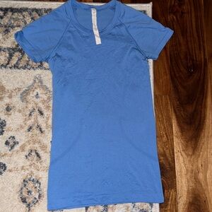 Blue lulu lemon swiftly tech shirt size 2